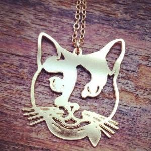 9 + Evelyn M curated cat designs + Island Woman