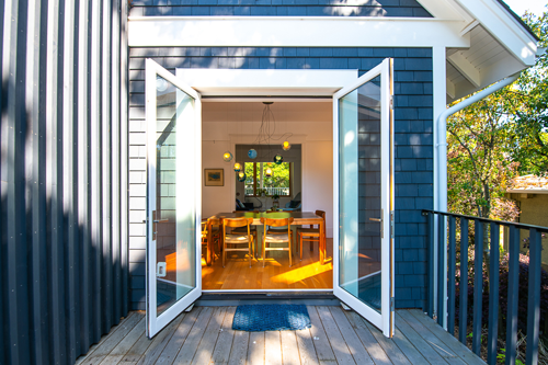 Deck entrance through French Doors into Dining Area by Angela Provost - Real Estate Photographer